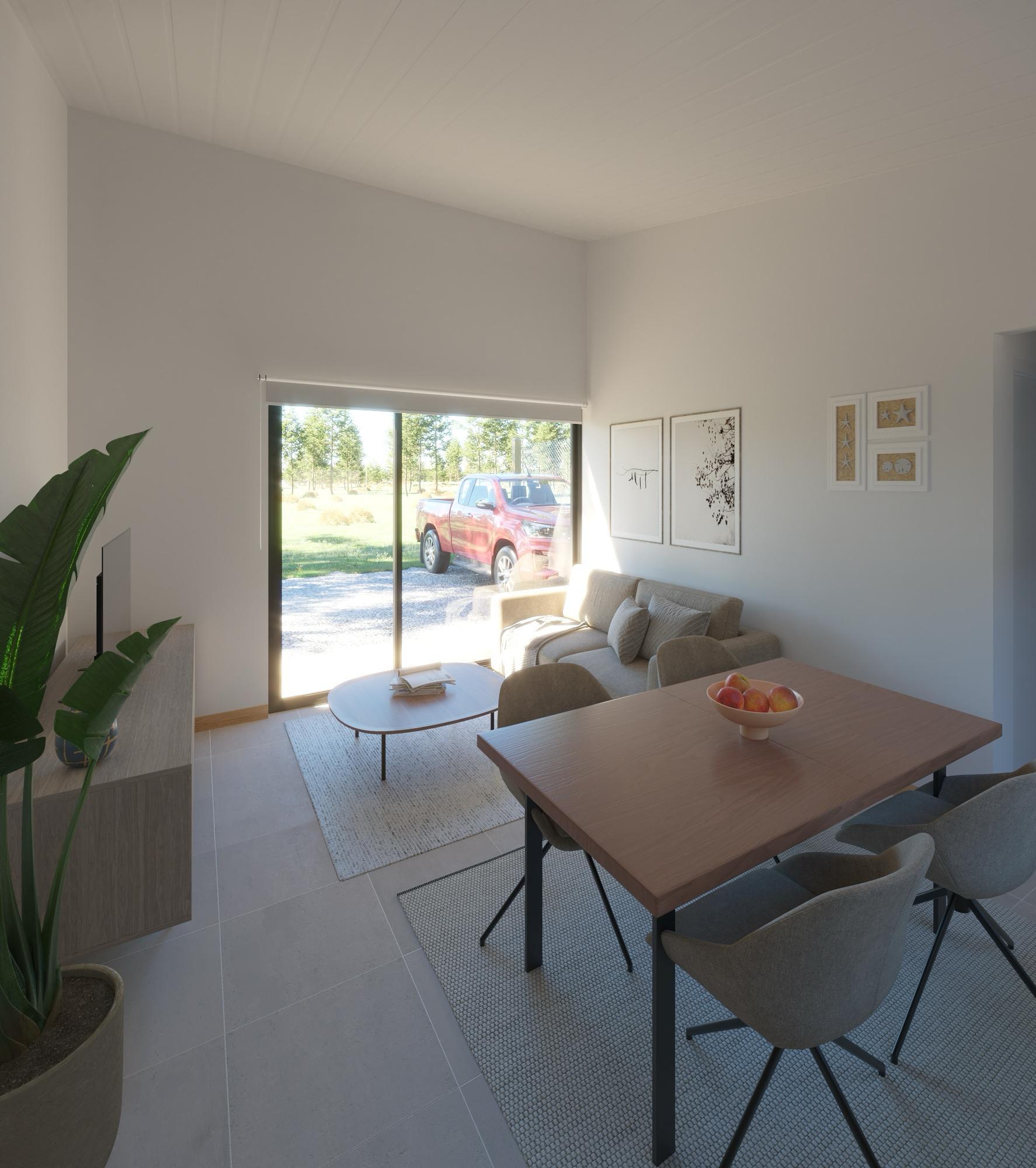 Living y comedor de vivienda Garabi Casas